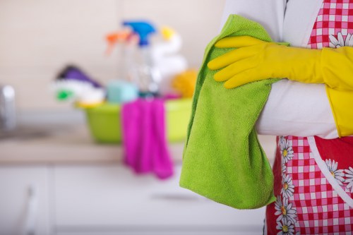 Carpet cleaning technician preparing safe equipment and protective measures