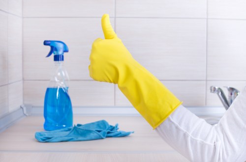Technician conducting a property safety check before carpet cleaning