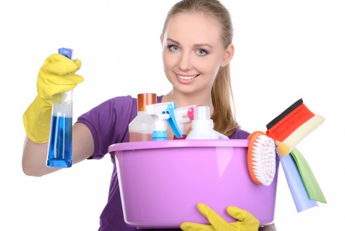 Local cleaners carrying out a move out clean in an Ilford property with cupboards and floors being detailed