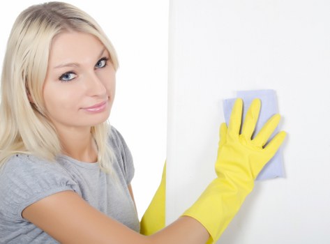 Cleaning a corner sofa in a local Ilford property