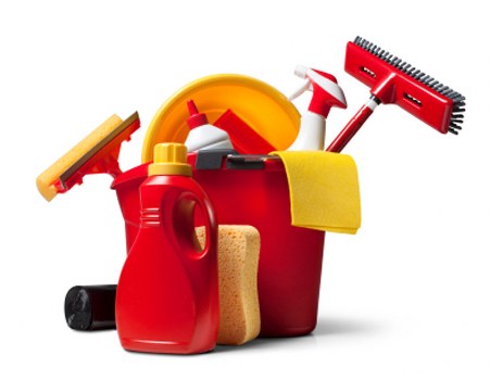 Dusting and sanitising office surfaces in a workplace near Ilford